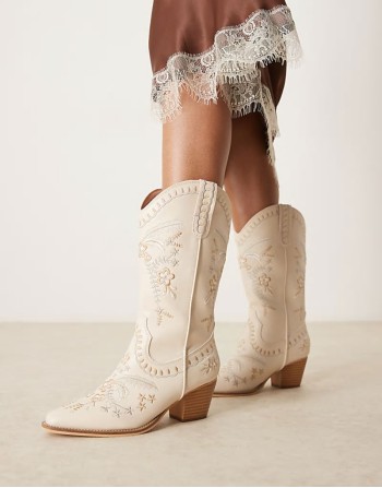 embroidered western knee boots in cream