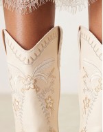 embroidered western knee boots in cream
