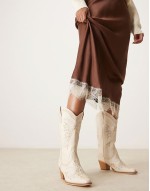 embroidered western knee boots in cream