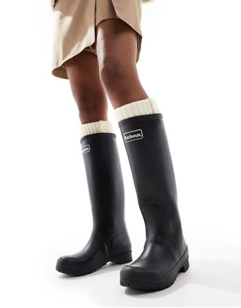 with Lucy Williams Abbey wellington boot with logo detail in black