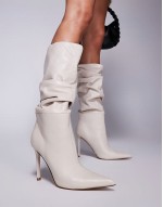 Schmooze pointed stiletto heel knee boots in cream