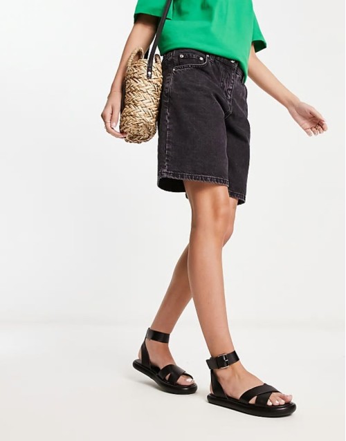 cross front buckle sandals in black