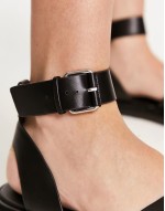 cross front buckle sandals in black