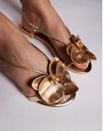 Magnolia 3D floral flat sandals in gold