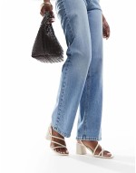 ‌Stylish cross strap heeled sandal in ecru